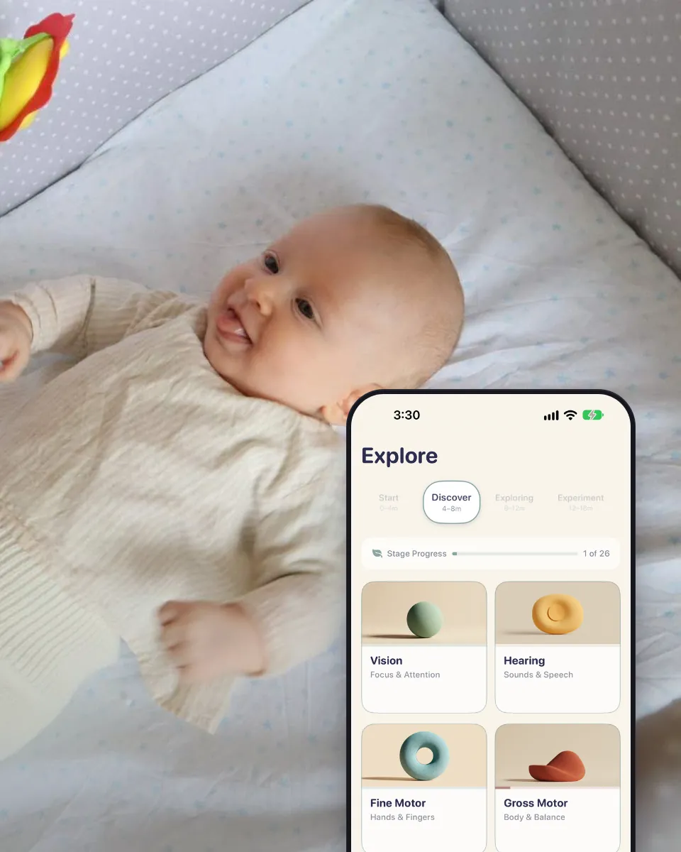 A baby in a crib looks at a rattle, next to the Explore screen with the activity areas.